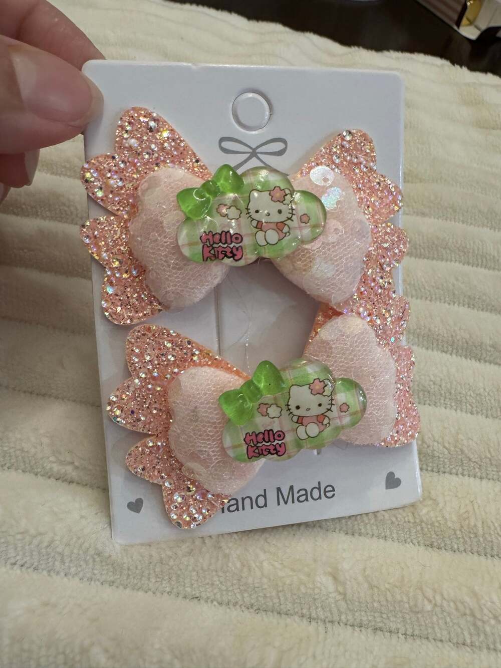 Hello Kitty peach pink glitter bow hair clips with Hello Kitty graphic hand made